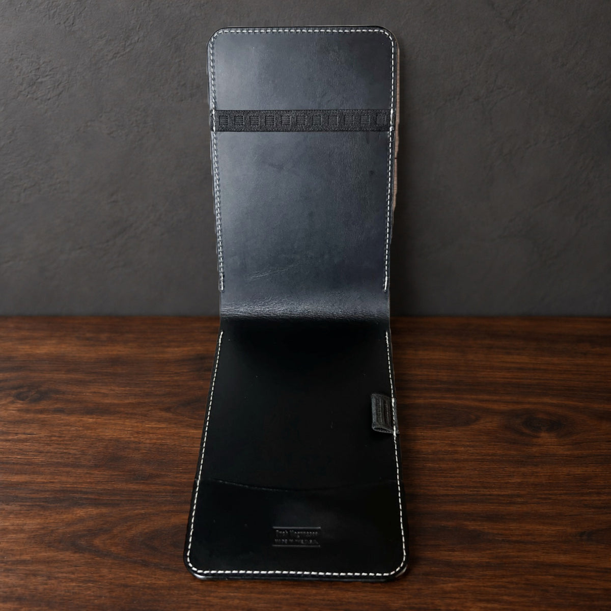 Inside the Augusta Classic yardage book cover: black interior, a top elastic, a full-length pocket and a pencil loop