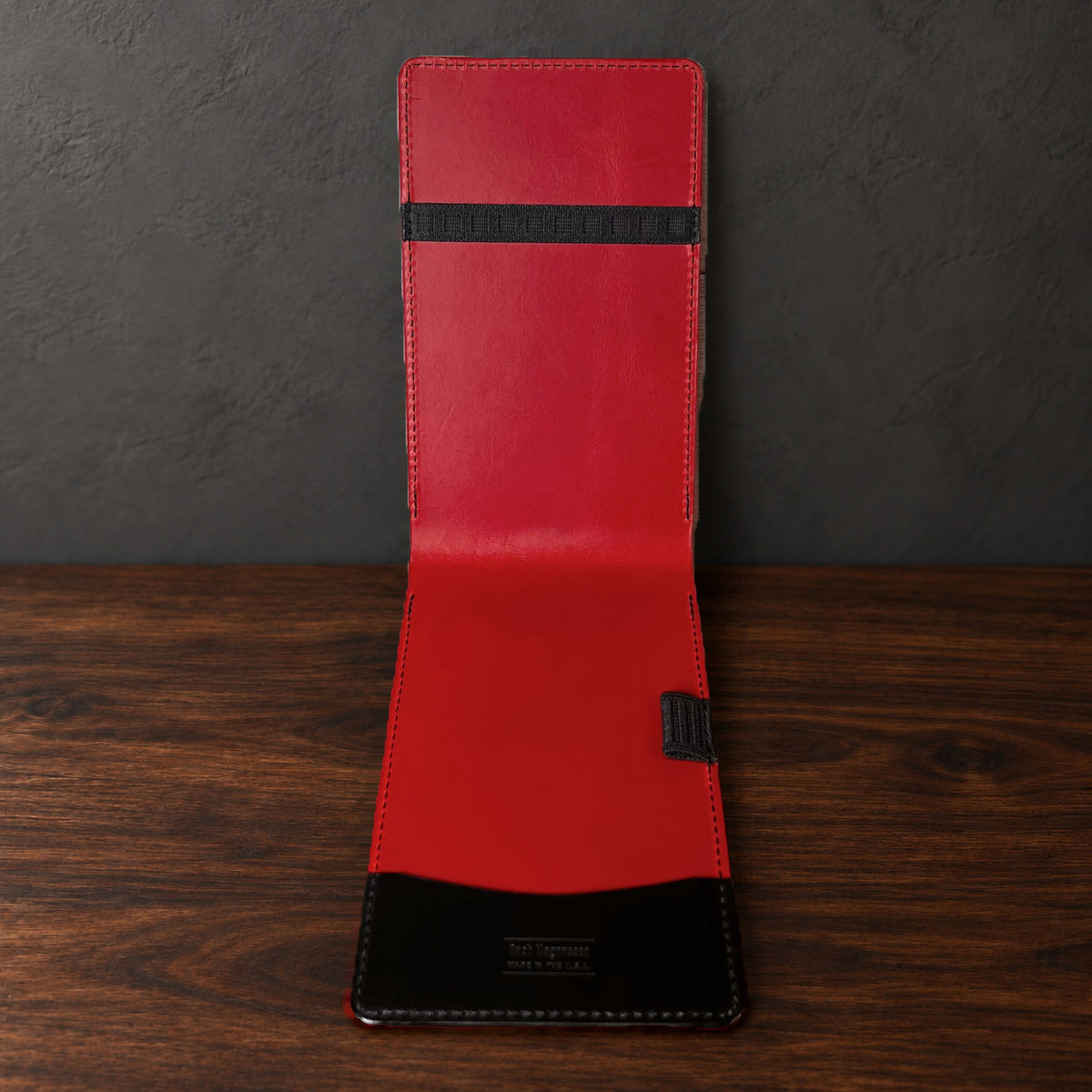 Inside the Augusta Pro yardage book cover: red interior, a top elastic, a full-length pocket and a pencil loop