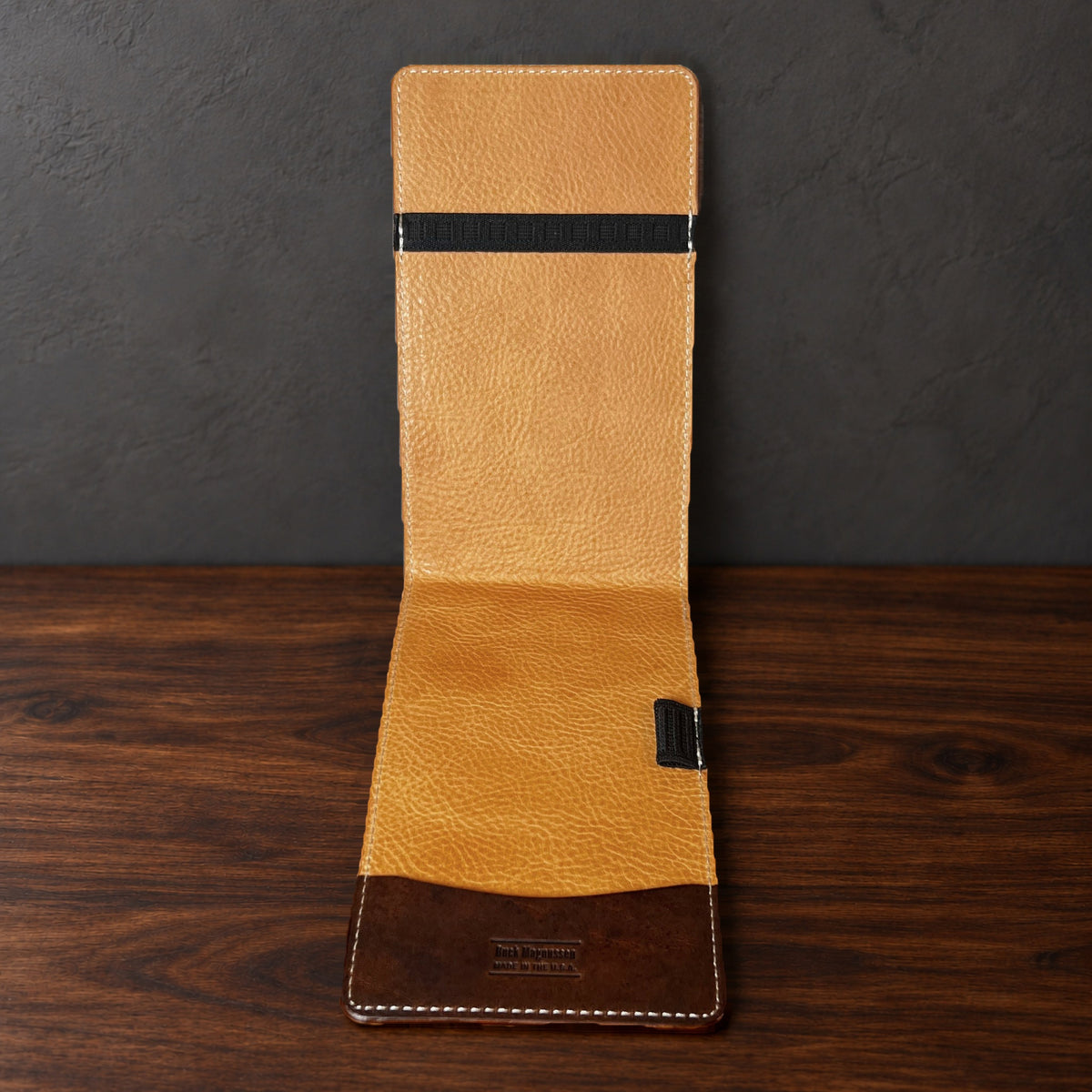 Inside the Augusta Pro yardage book cover: natural interior, a top elastic, a full-length pocket and a pencil loop