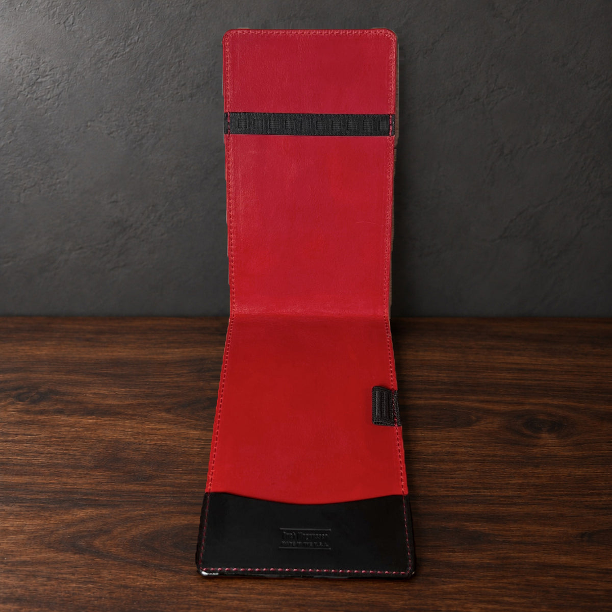 Inside the Augusta Pro yardage book cover: red interior, a top elastic, a full-length pocket and a pencil loop