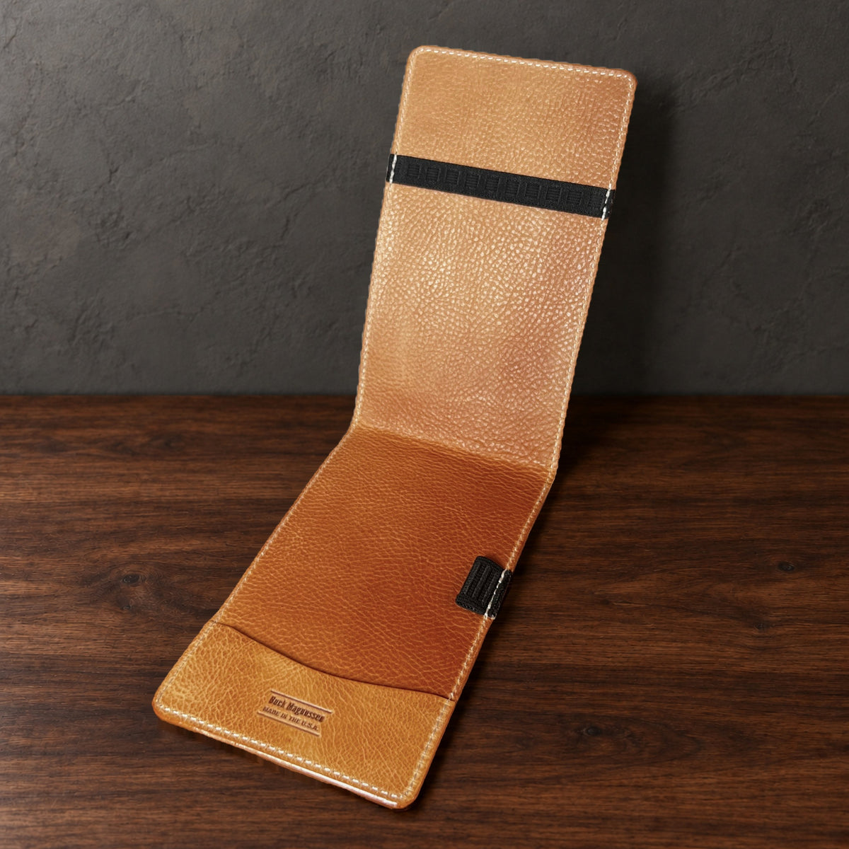 Augusta Pro yardage book cover in Natural Waxy standing open, showing the natural interior