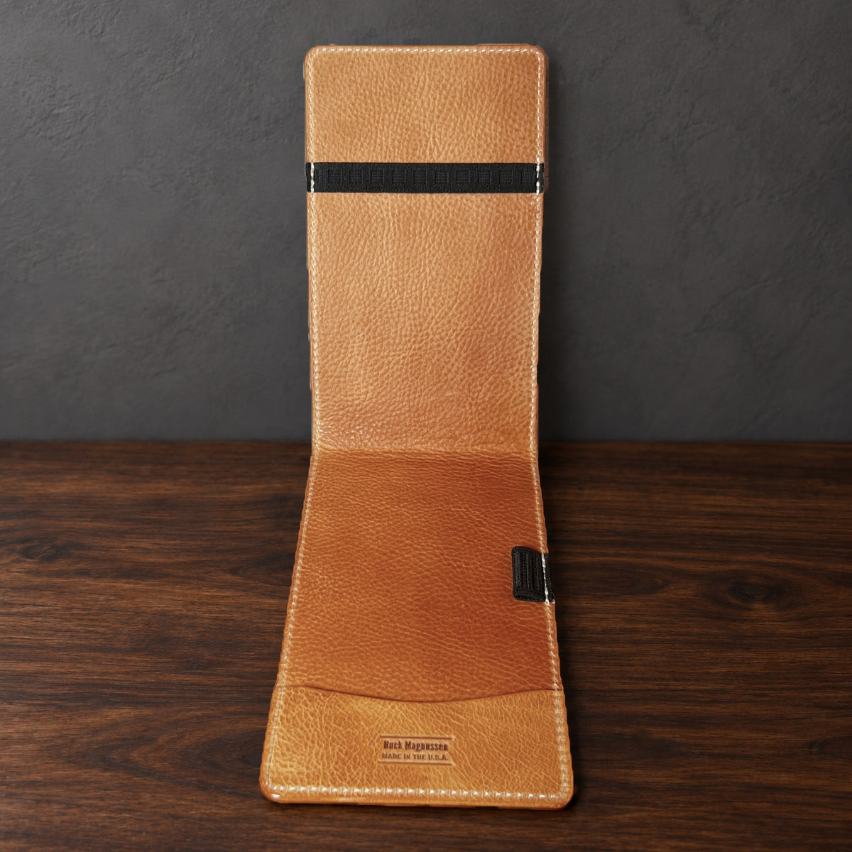 Inside the Augusta Pro yardage book cover: natural interior, a top elastic, a full-length pocket and a pencil loop