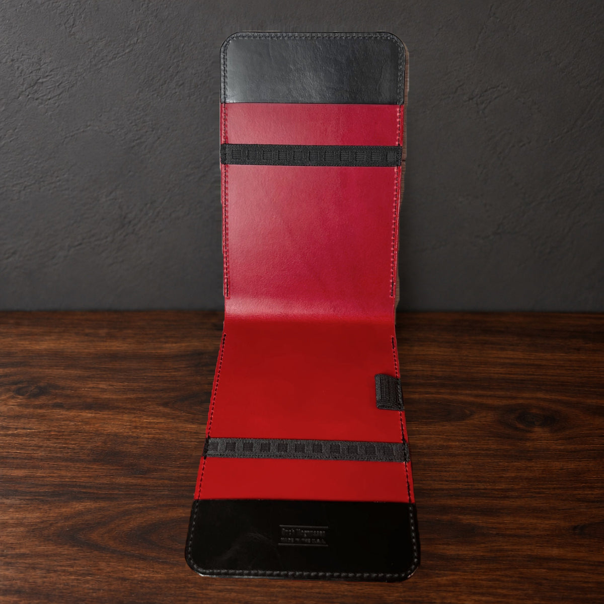 Inside the Oakmont Classic yardage book cover: red interior, elastics at the top and bottom and a pencil loop