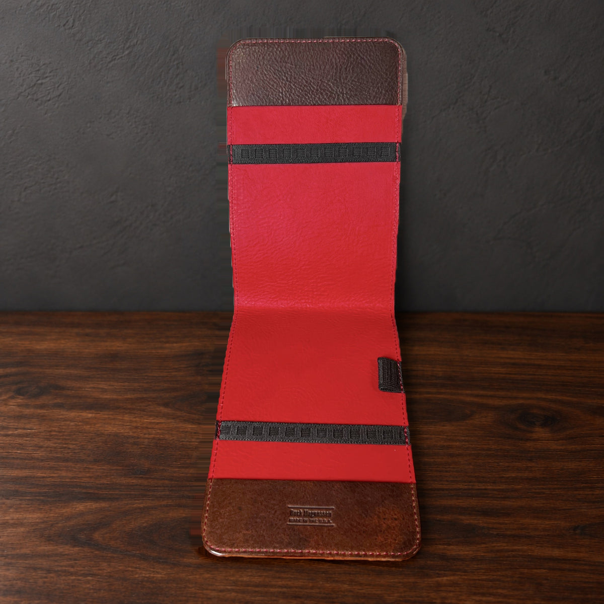 Inside the Oakmont Classic yardage book cover: red interior, elastics at the top and bottom and a pencil loop