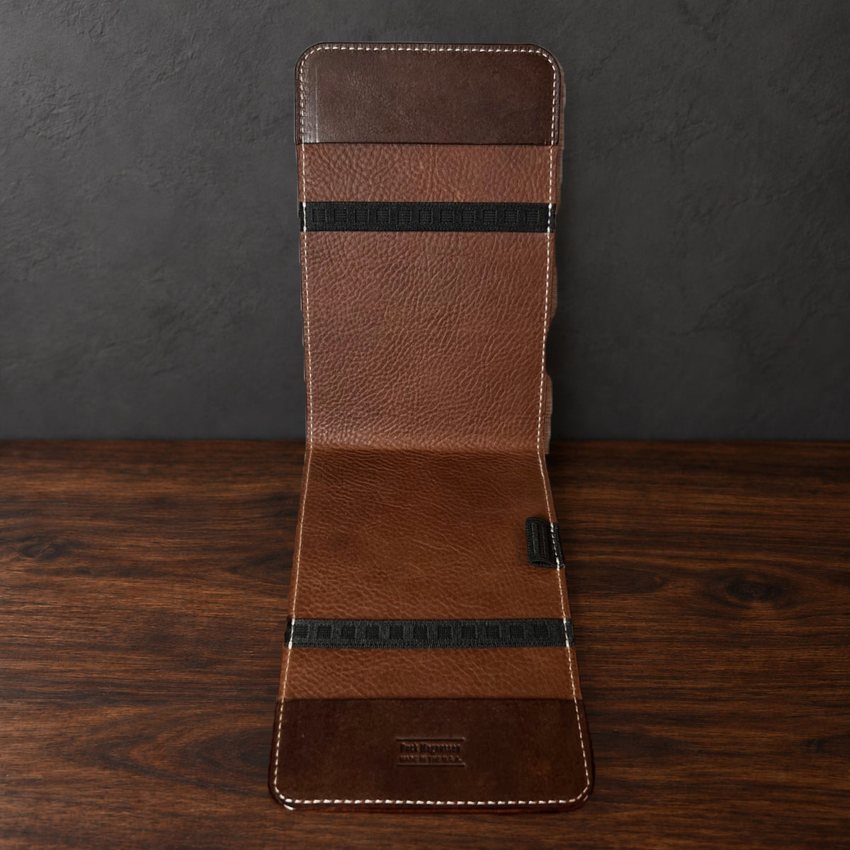 Inside the Oakmont Classic yardage book cover: whiskey interior, elastics at the top and bottom and a pencil loop