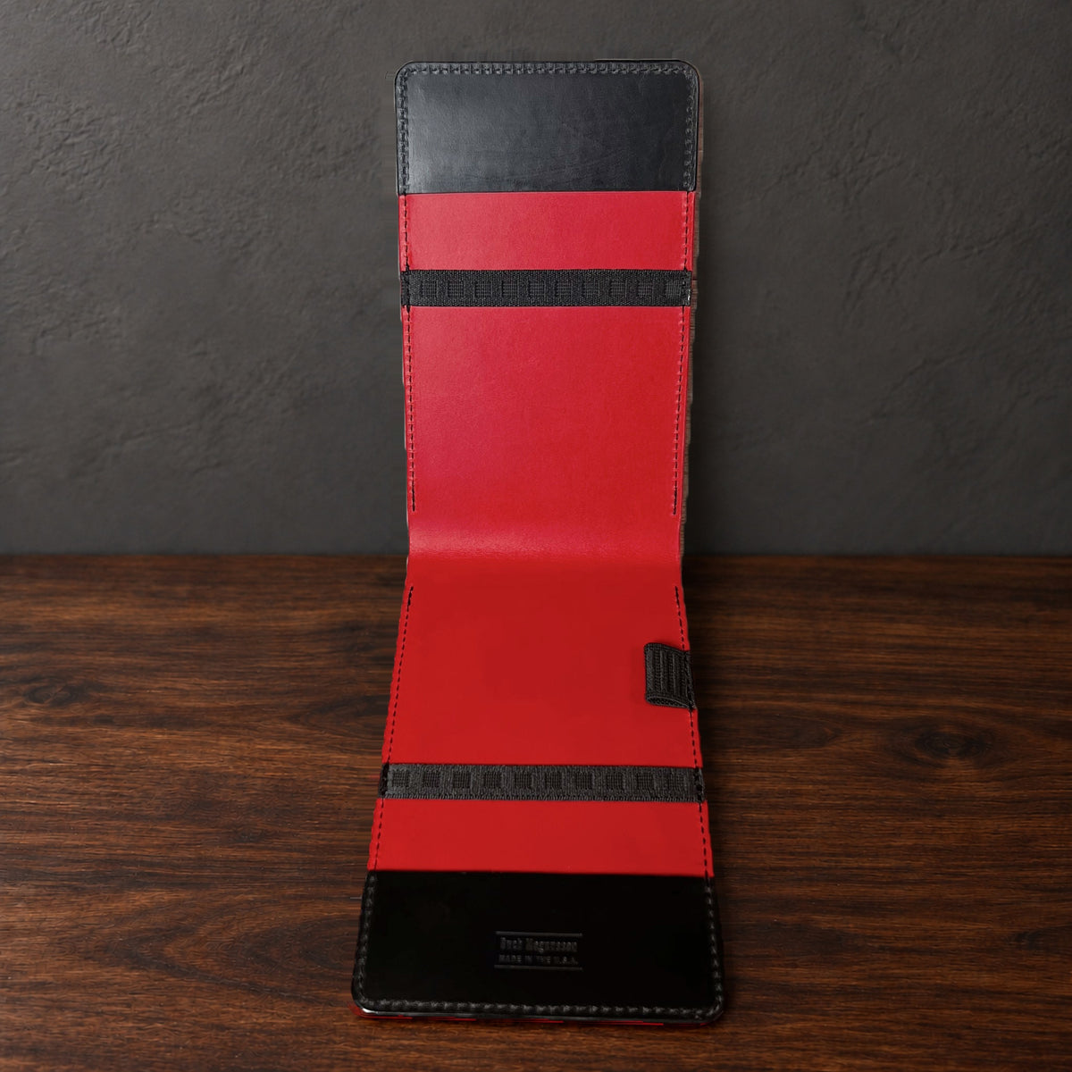 Inside the Oakmont Pro yardage book cover: red interior, elastics at the top and bottom and a pencil loop