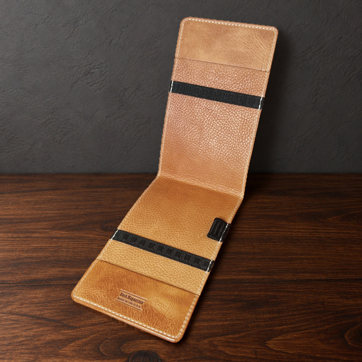 Oakmont Pro yardage book cover in Natural Waxy standing open, showing the natural interior